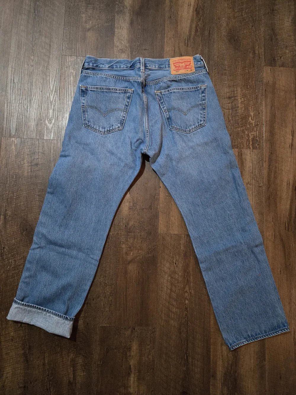 Levi's 501 Men's Straight Jeans - Medium Wash.